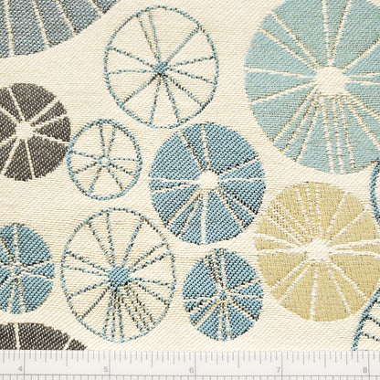Circles and Wheels on Cream Fabric
