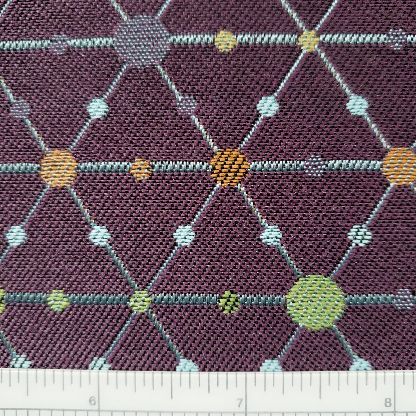 Wheels of Dots on Amethyst Fabric